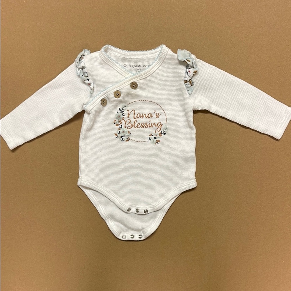 White Long Sleeve Baby Onesie with Floral Design